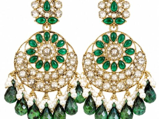 Green kundan chandbali earrings with crystal stones, pearl accents and pink teardrop bead hangings for women