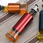 Glass Oil Dispenser 300ml with Plastic Cover – Oil & Vinegar Bottle with Golden Pour Spout - Image 3